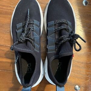 On Running Black and White Athletic Shoes with Sleek Design